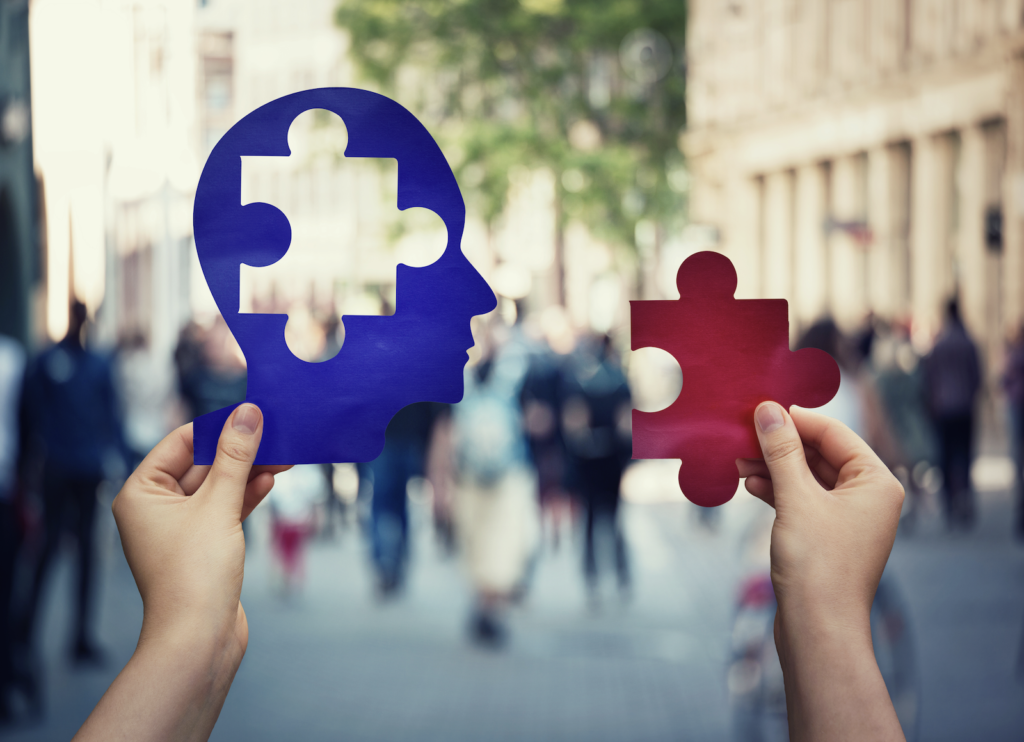 neuroplasticity training: hands holding puzzle pieces