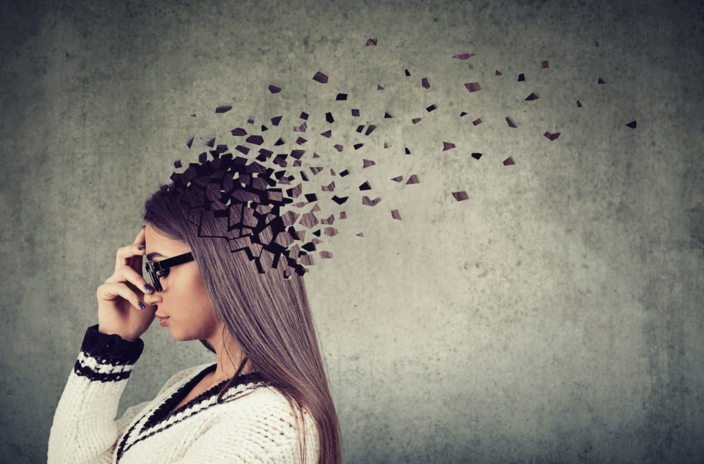 memory training: Side profile of a woman with parts of her head fading away