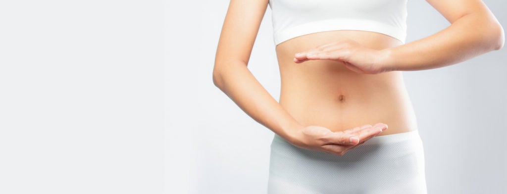 Woman with her hands near her stomach