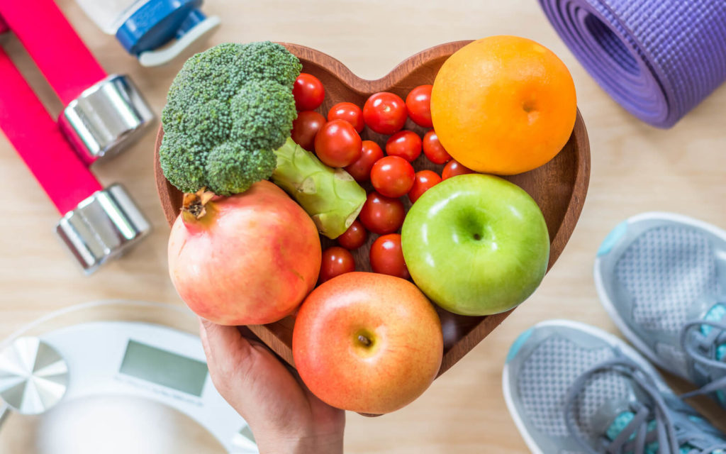 How to take care of your heart: veggies in heart-shaped bowl