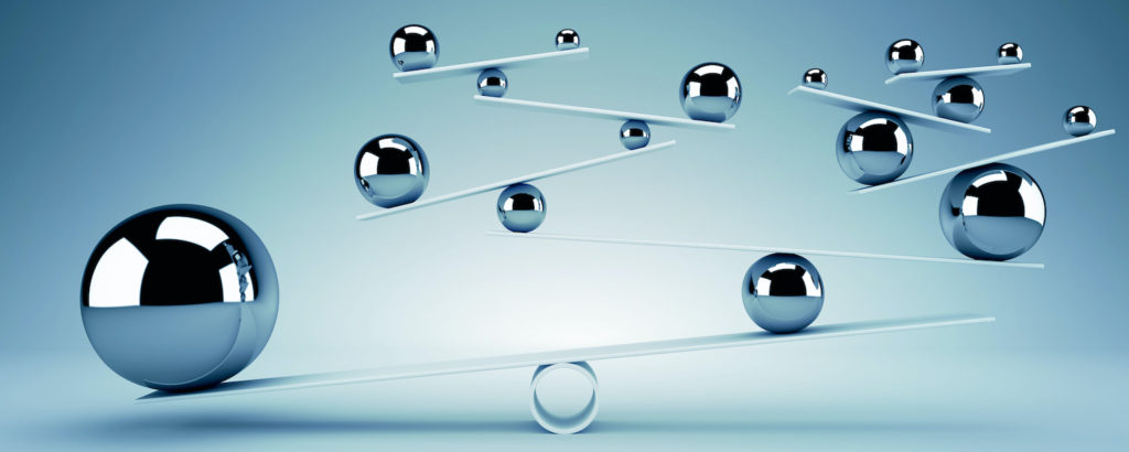 Chrome balls on planks showing the concept of balance