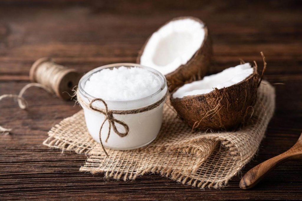 How to use MCT oil: open coconut and a jar of coconut oil