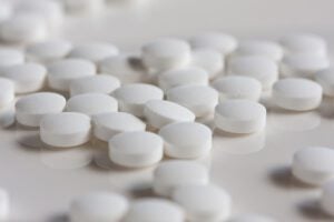A Guide to Low-Dose Naltrexone Benefits (& Is it Safe?)